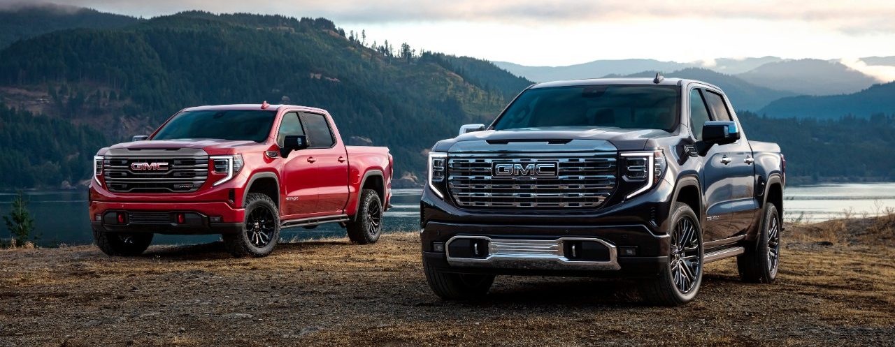GMC Sierra Denali Ultimate two cars